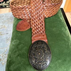 Vintage woven leather belt,  patterned brass buckle with pick. 45 x2 inches.